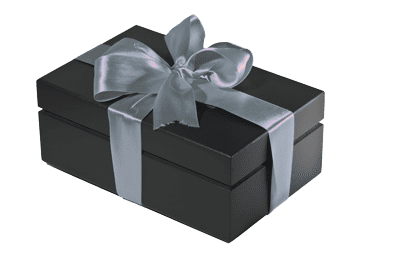 Norman-Hege-Jewelers-gift-box Norman Hege Jewelers | A black gift box wrapped with silver ribbon and a bow